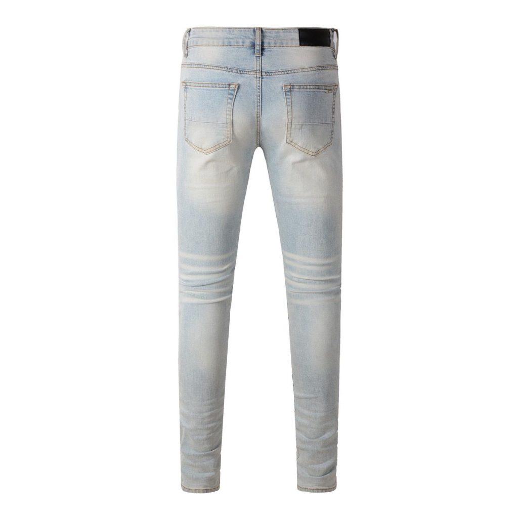 Amiri Embossed Logo Light Wash Jeans OKZY202602