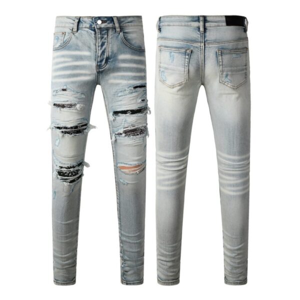 Amiri Multi‑Patch Ripped Jeans OKZY202641
